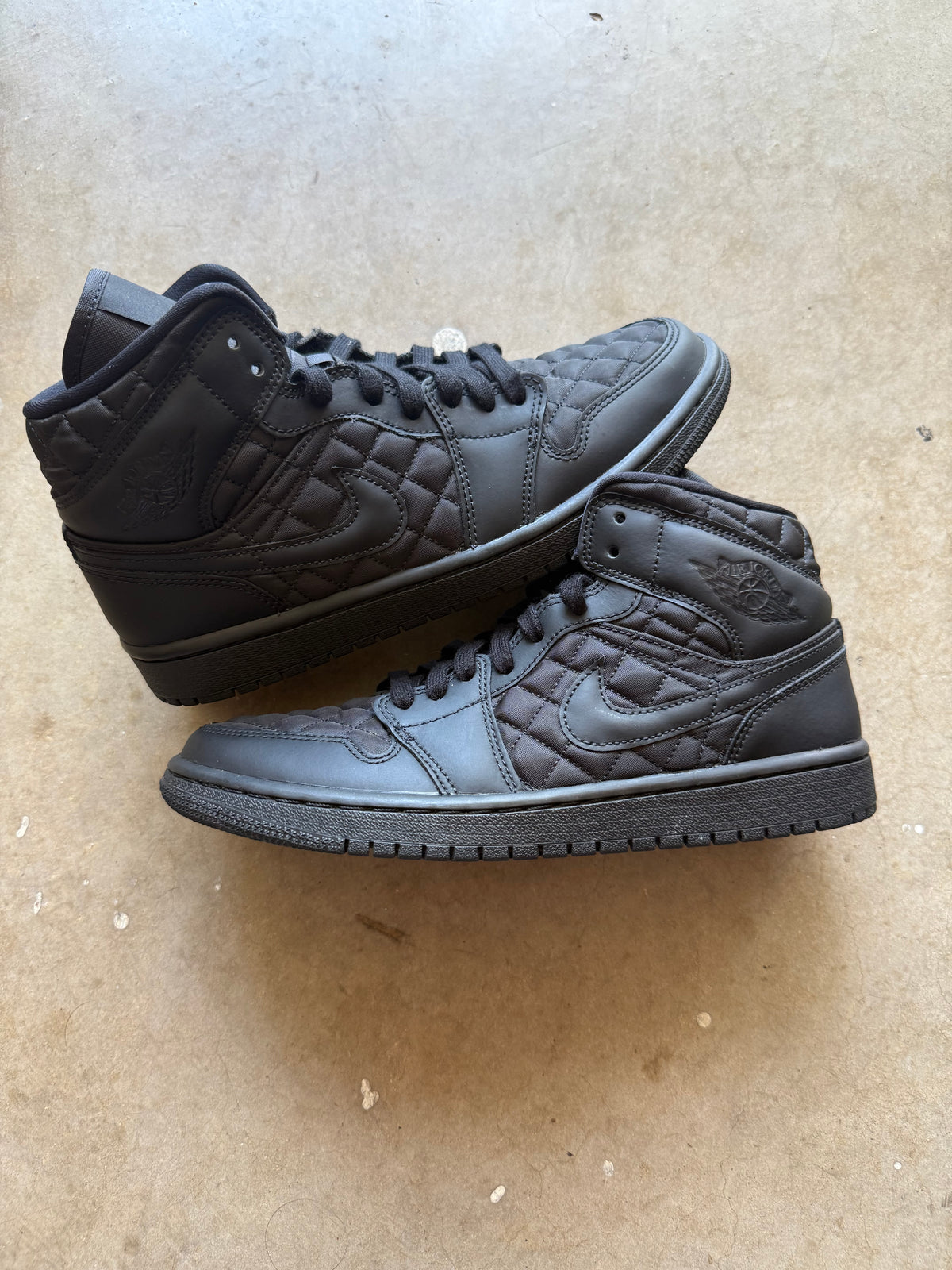 JORDAN 1 MID QUILTED BLACK (WMNS)
